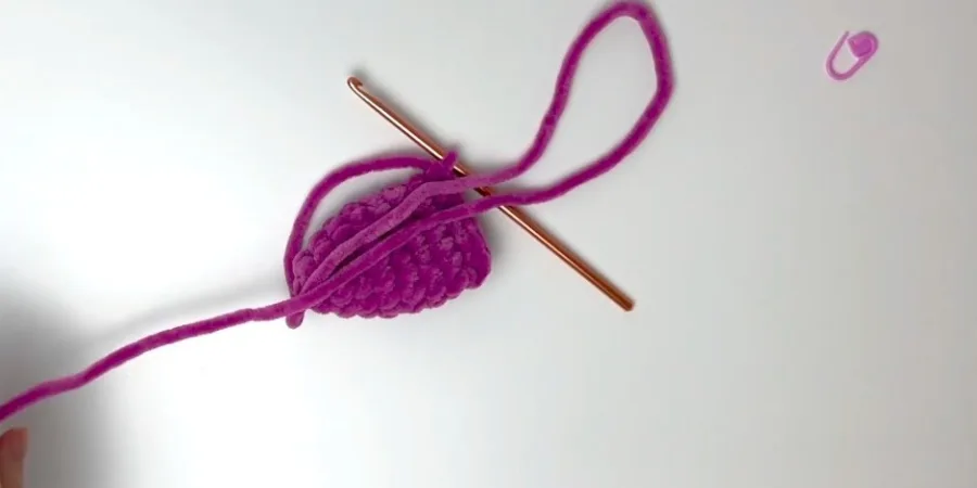 Crocheting a purple ear piece for the strawberry cow amigurumi pattern