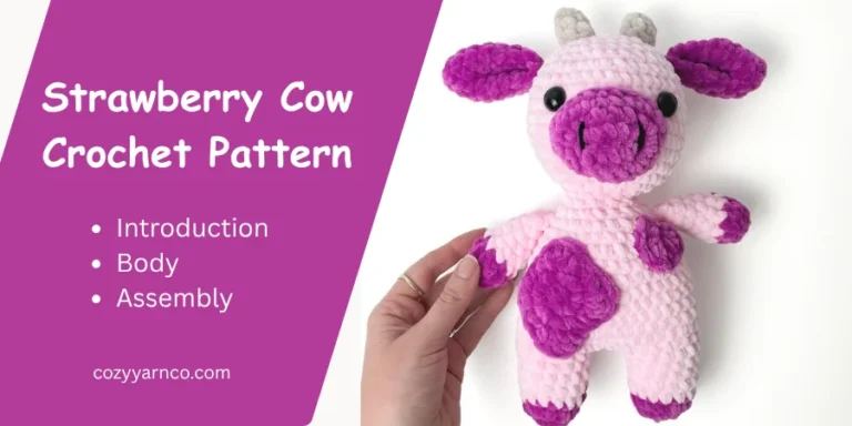 Finished pink and purple strawberry cow crochet plush with spots, horns, ears, and heart patch